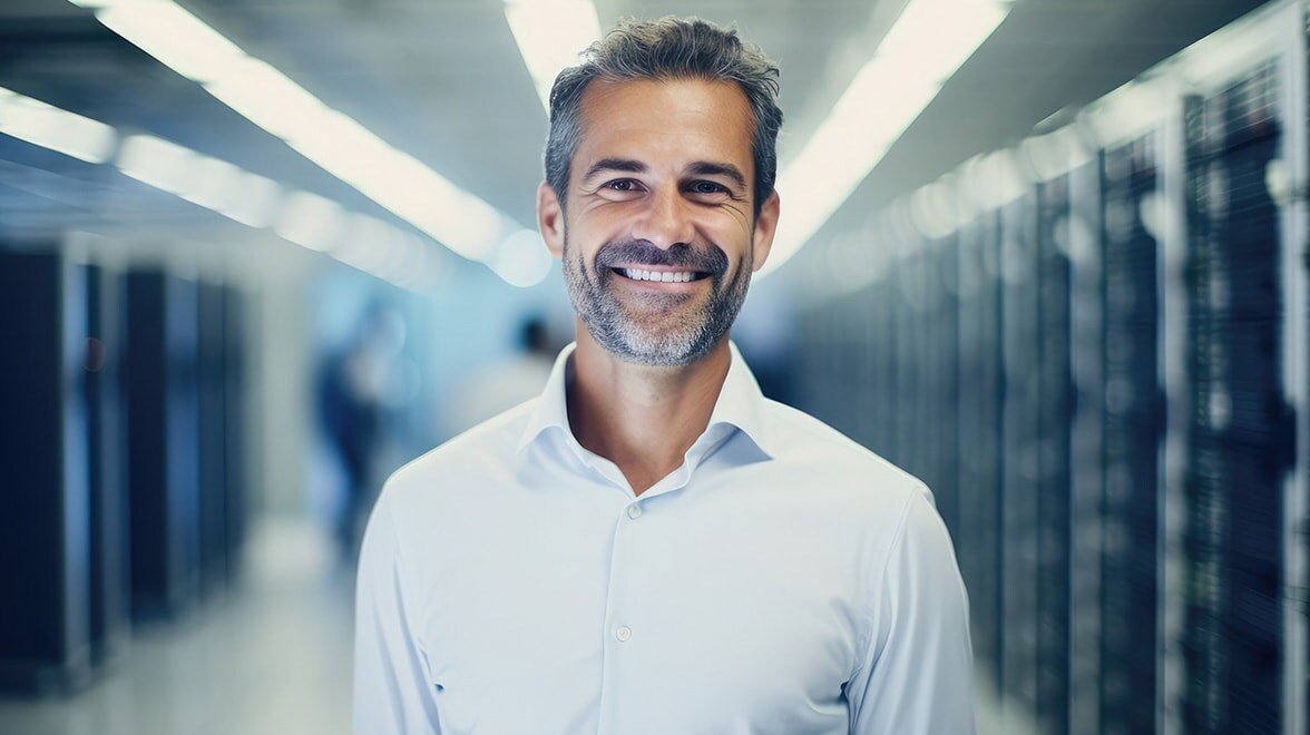 A Person posing to the camera with a smile