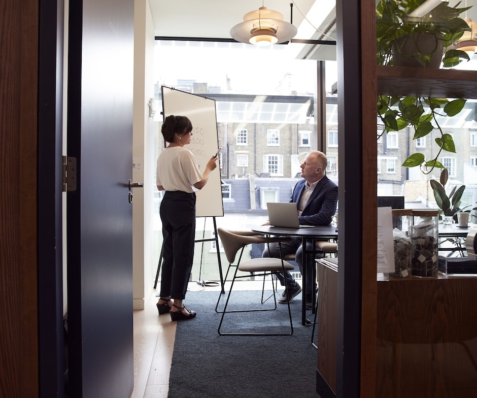 a person presenting in an office