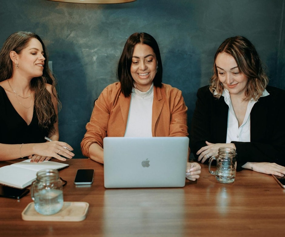 women working on laptop
