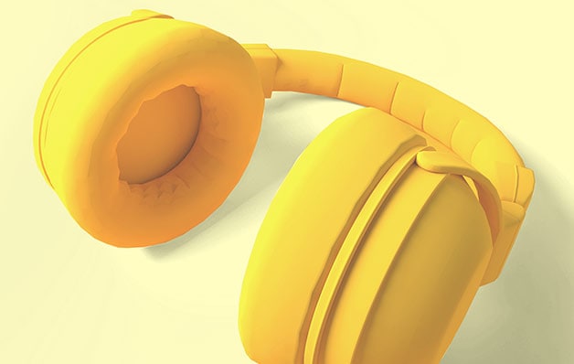 Yellow headphones on yellow background