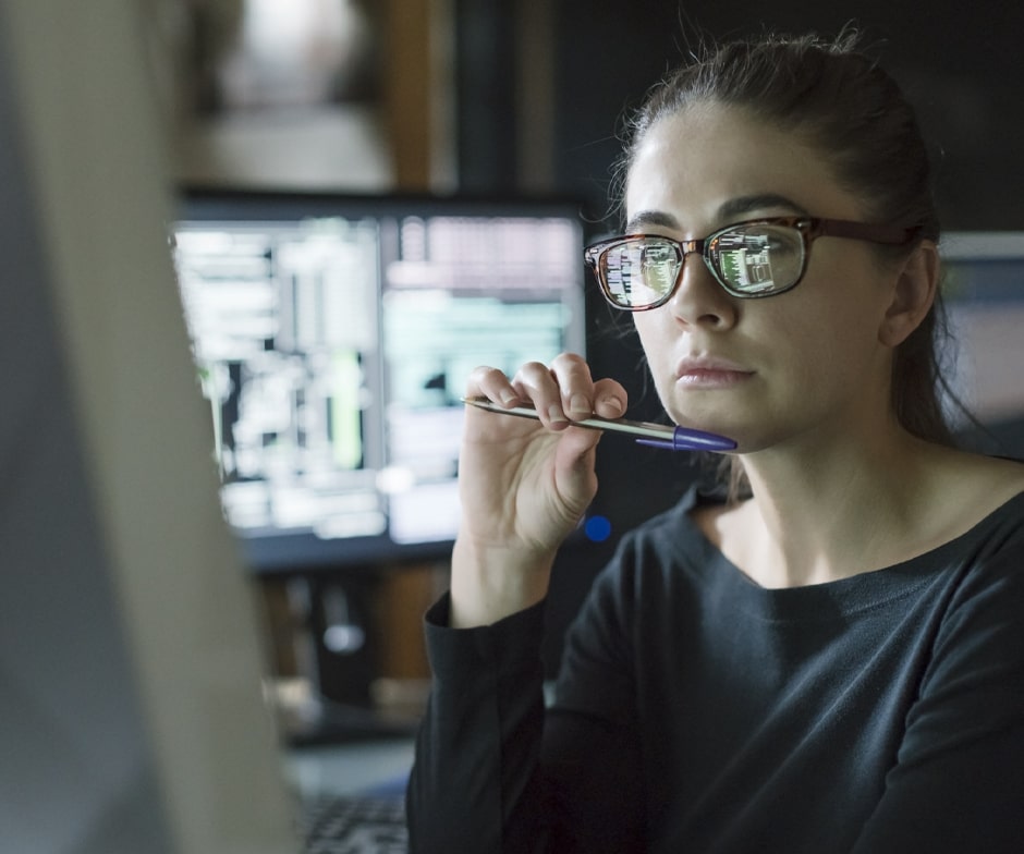 a person thinking in front of monitor