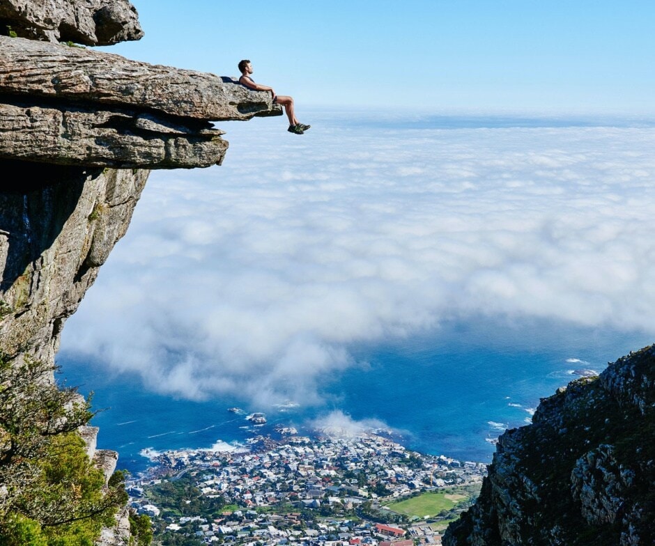 Person at the top of a cliff