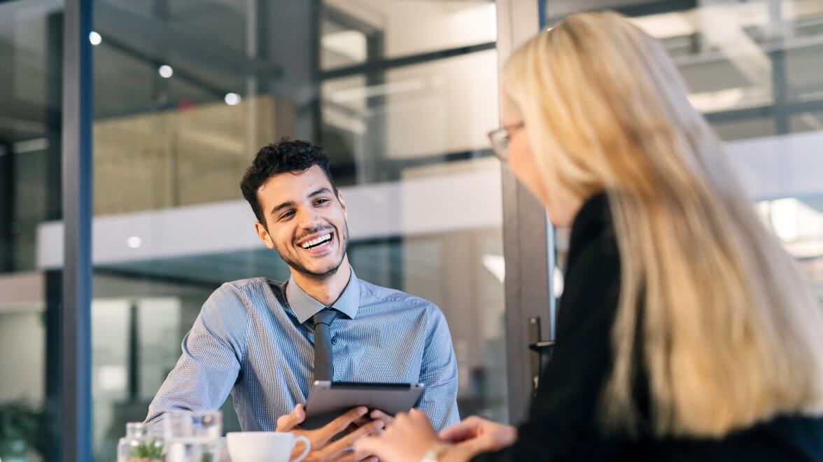 Two people chatting and laughing