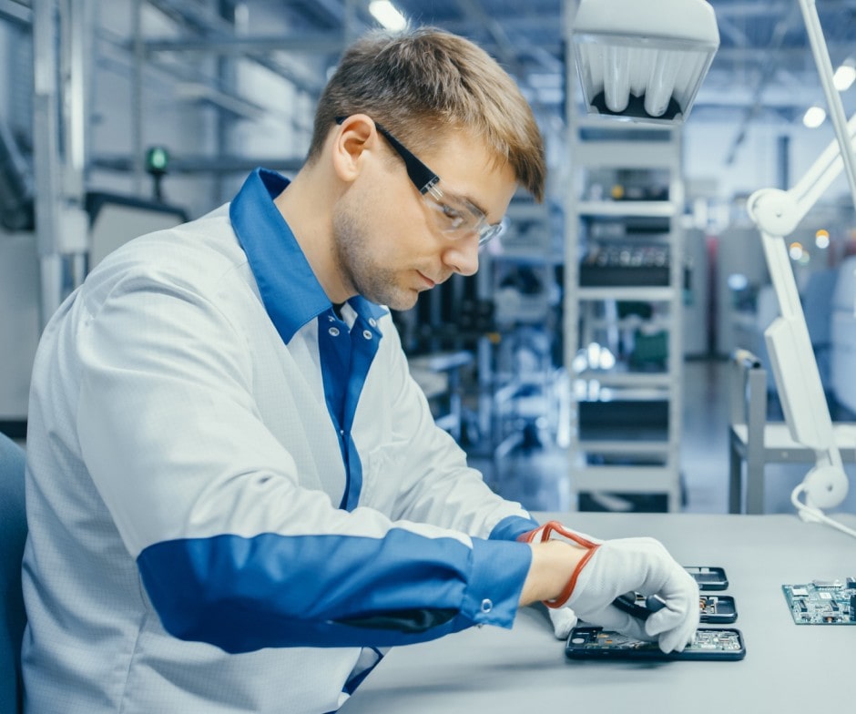 a person repairing smart phones