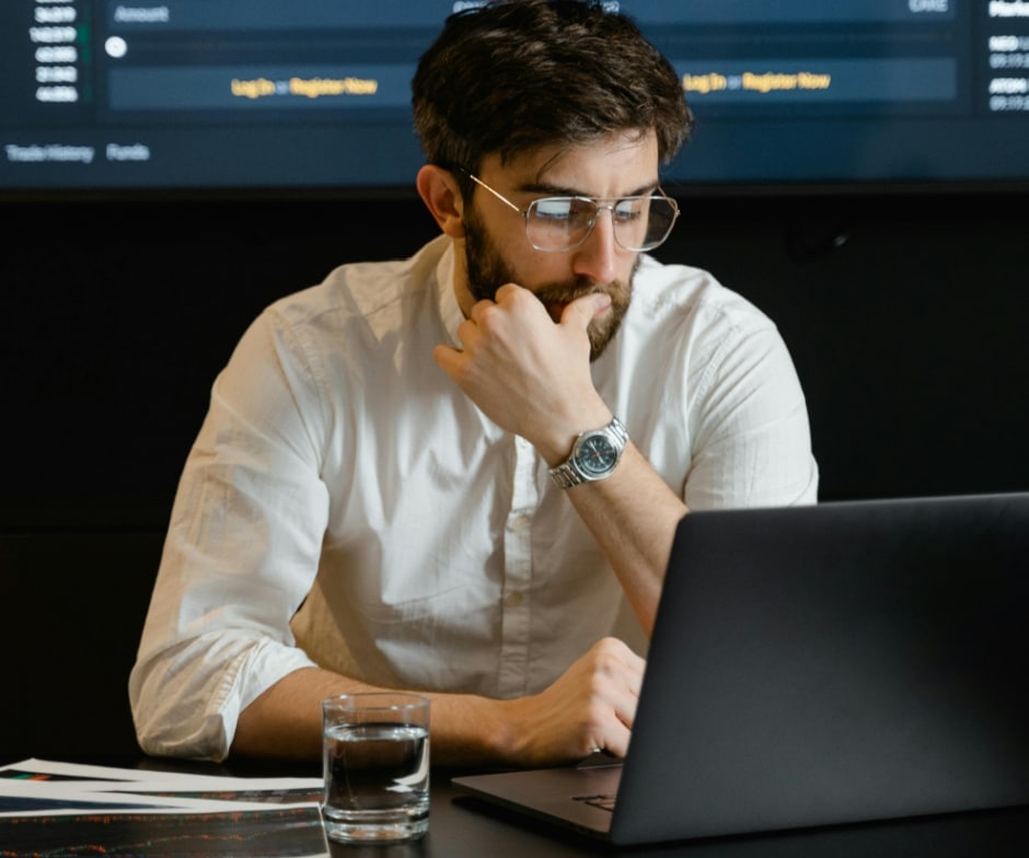 A Person looking into the laptop and working