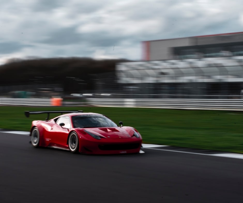 red car on a racetrack