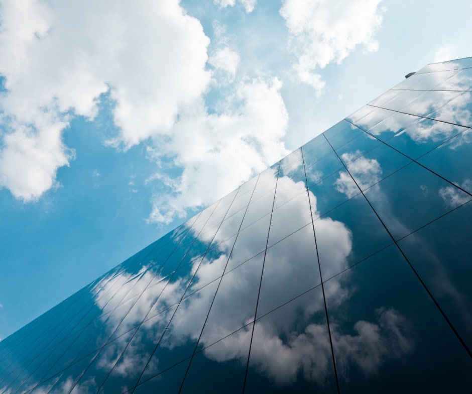 top view of a building with clouds on top