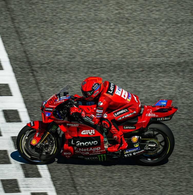 A Ducati rider crosses the finish line of the MotoGP 2025 Thai Test