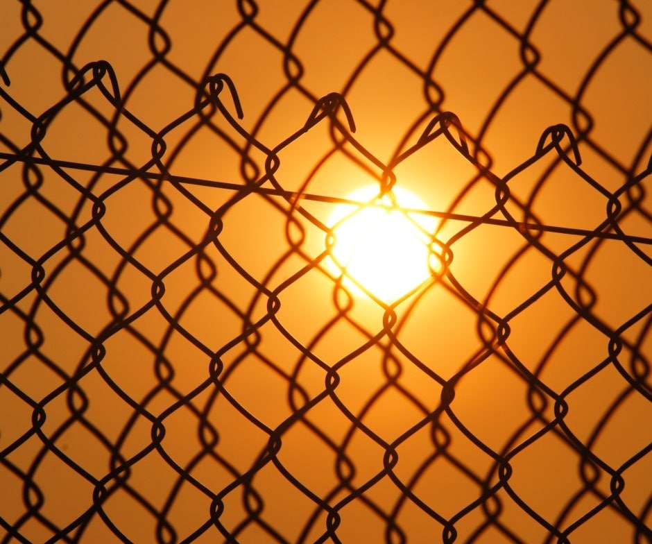 Sun behind the gate