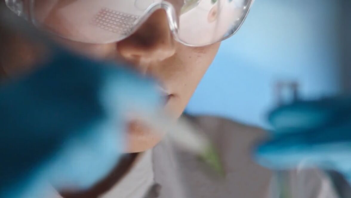 person wearing professional glasses and analyzing
