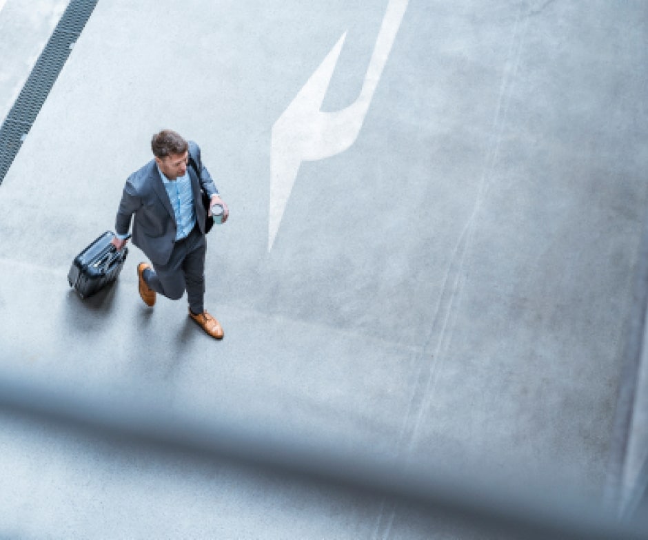 man walking with a bag