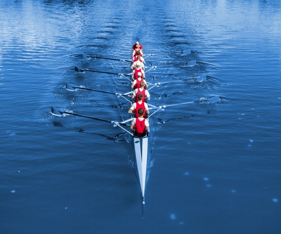 people rowing boats