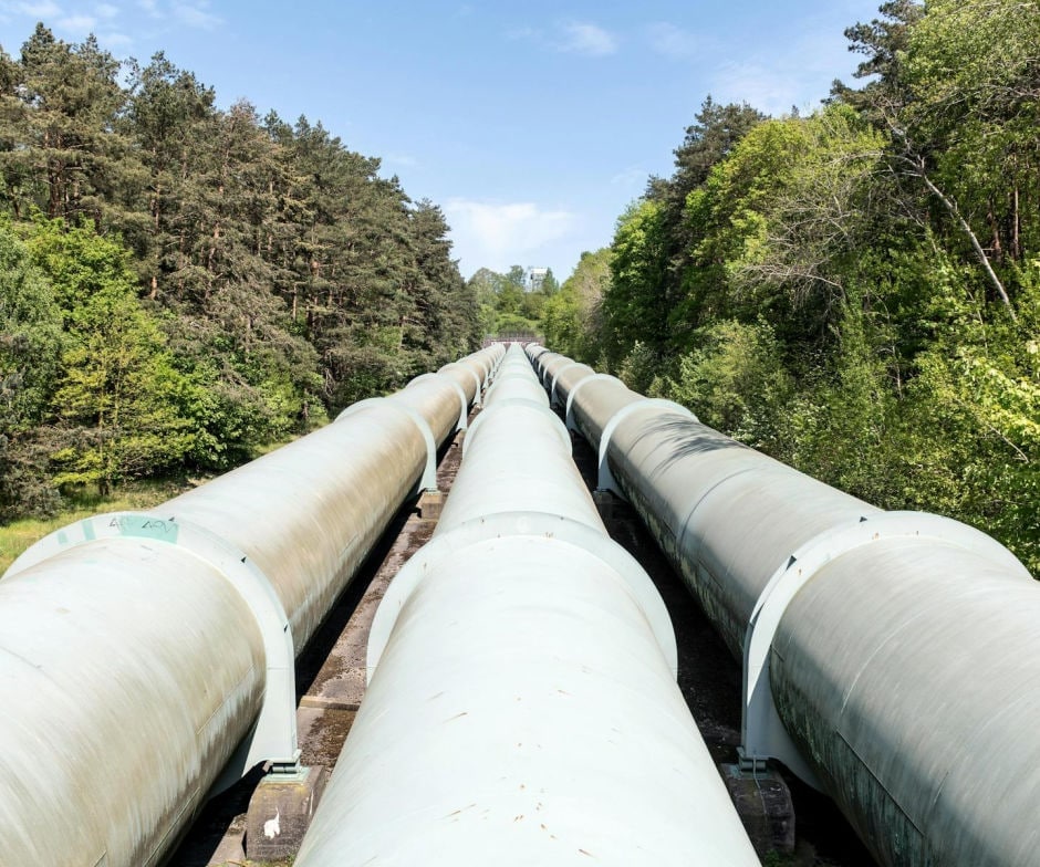 3 pipes laid down in farmland