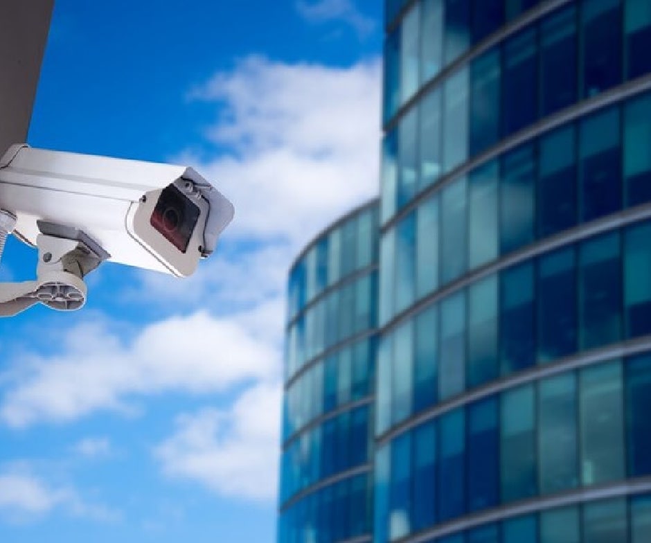 security camera with building in the background