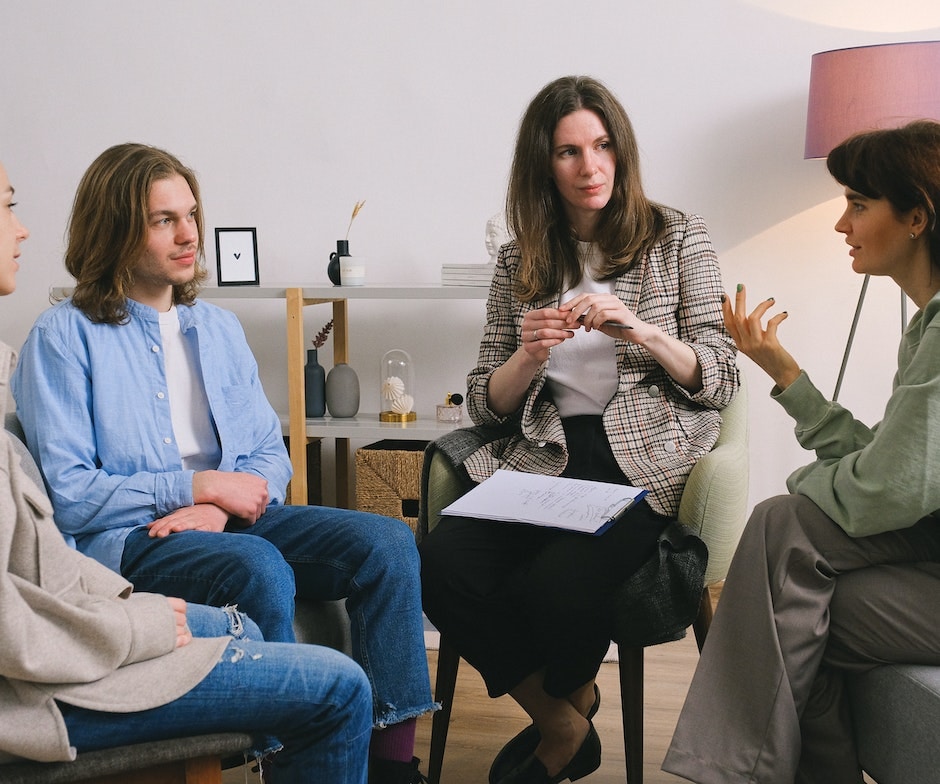 people in discussions in meeting room