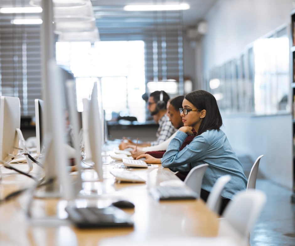 people wokring on a computer