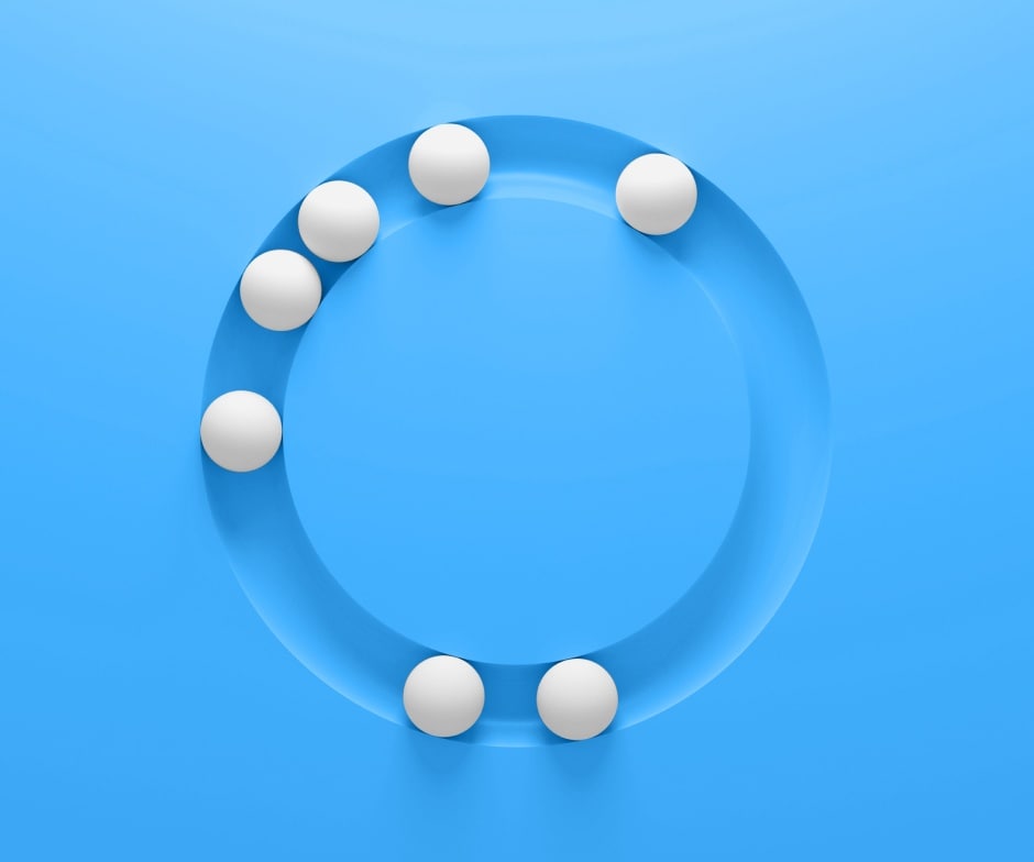 blue background with white spheres