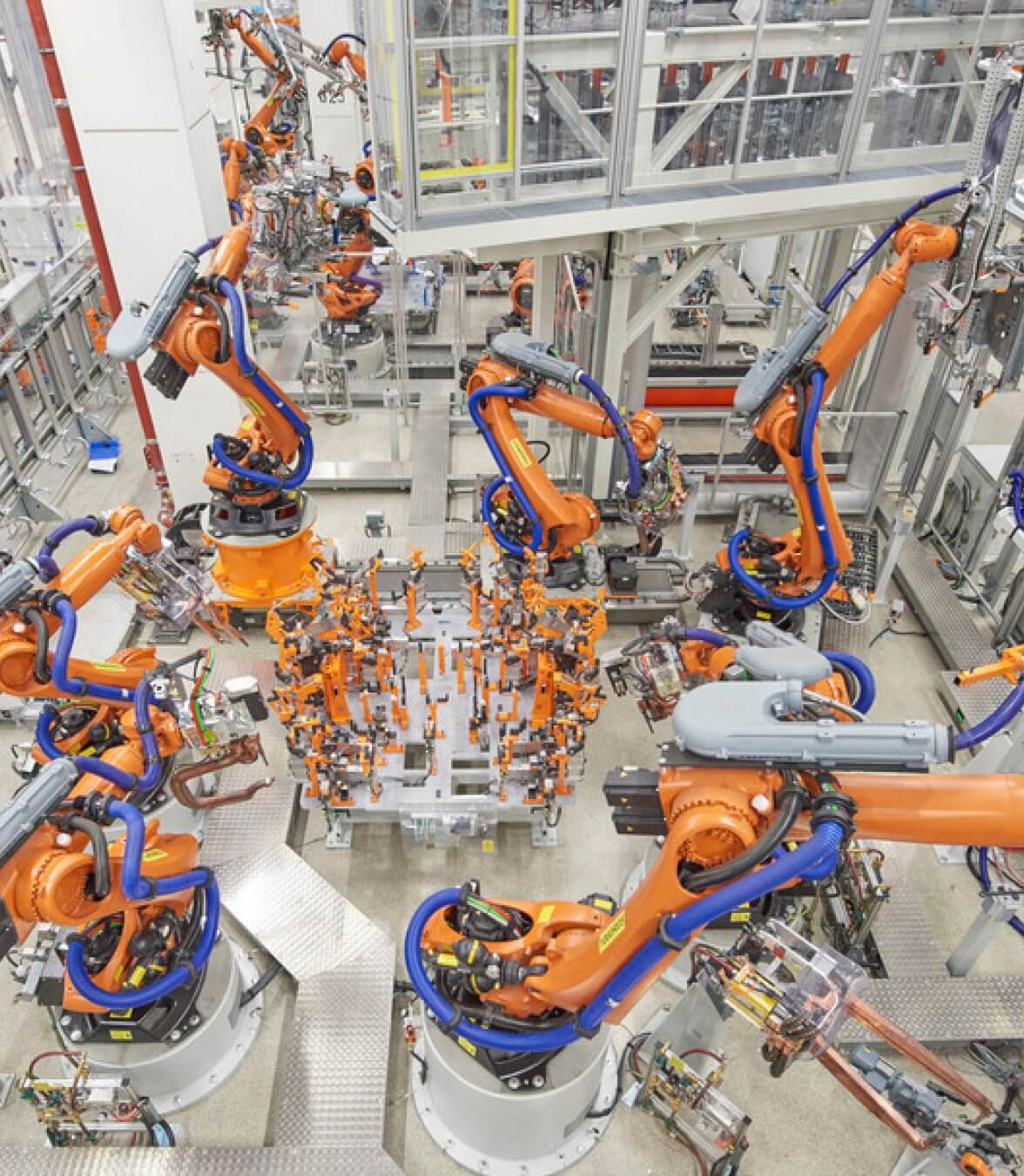 Industrial robots in a manufacturing facility