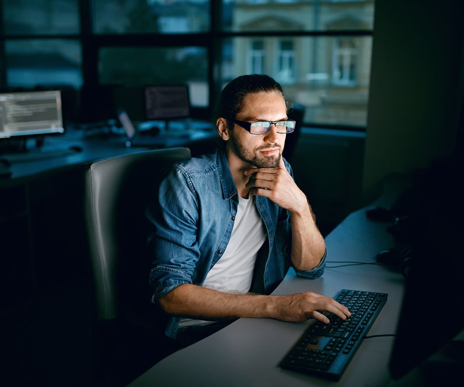 guy looking at computer screen