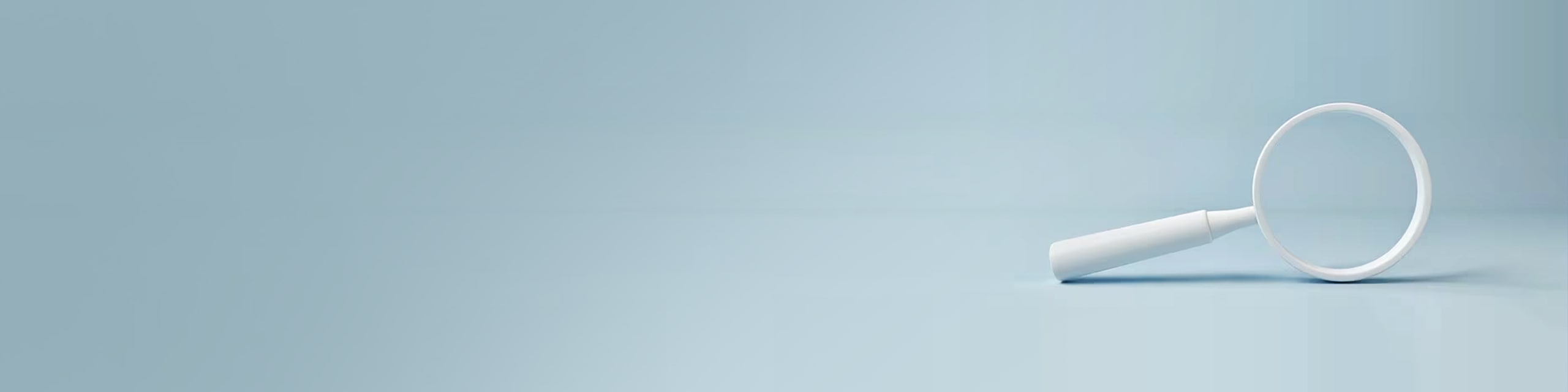 Magnify glass on gray background