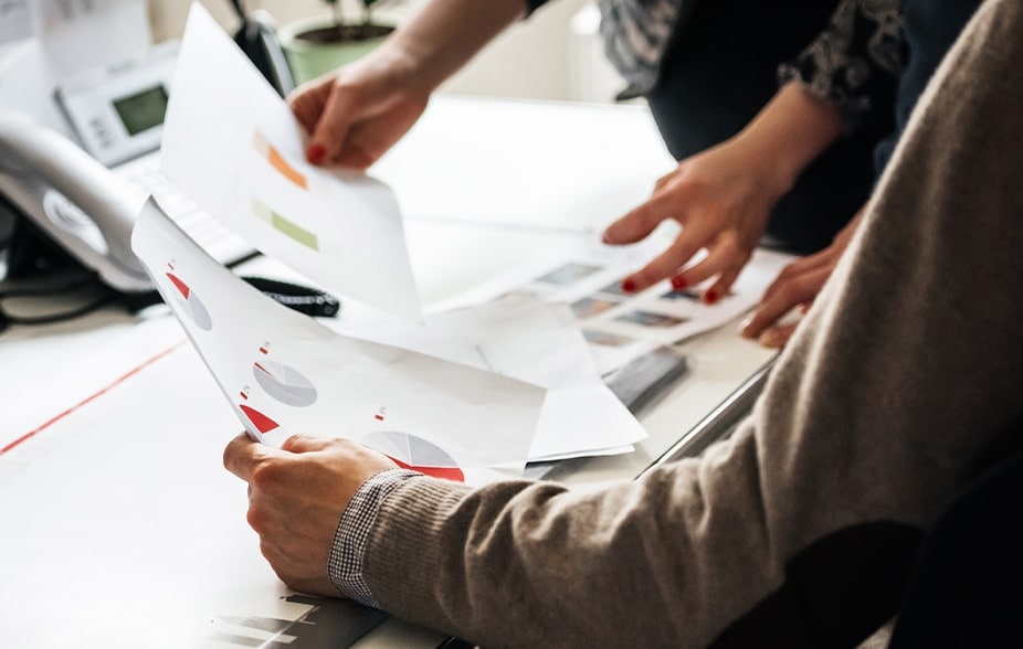 People analyzing data charts