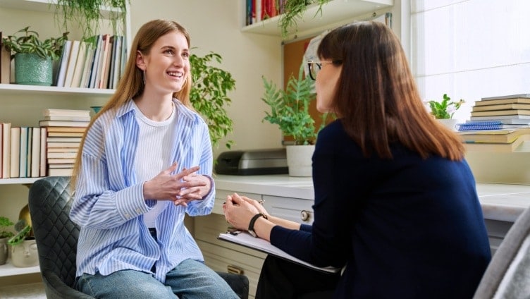Two people discussing