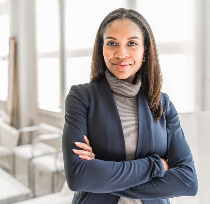 person standing with arms crossed