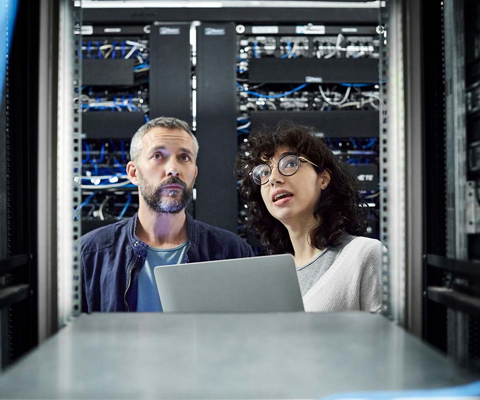 two people talking in datacenter